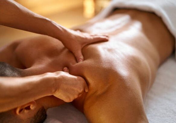 Close-up of a man getting  massage